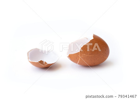 Cracked or broken brown egg shell isolated on white background. Breakfast food Cracked or broken brown egg shell isolated on white background. Breakfast food 79341467