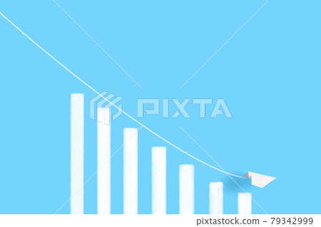 Falling bar charts and paper planes 79342999