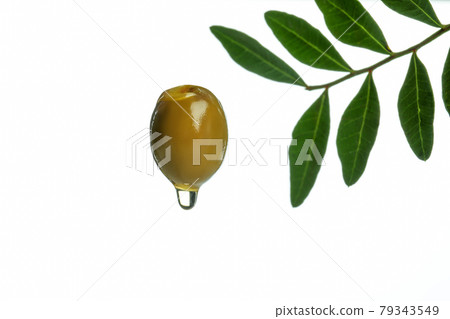 Green olive with oil isolated on white background Green olive with oil isolated on white background 79343549