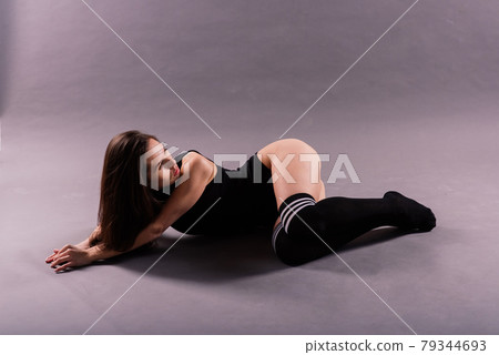 Young and beautiful dancer posing in studio Young and beautiful dancer posing in studio 79344693