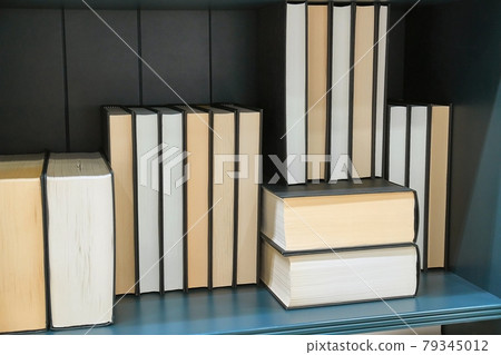 Books on a shelf Books on a shelf 79345012