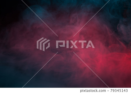 Colorful smoke on a black background closeup Colorful smoke on a black background closeup 79345143