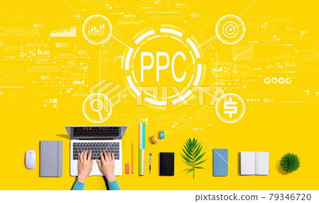 PPC - Pay per click concept with person using a laptop PPC - Pay per click concept with person using a laptop 79346720