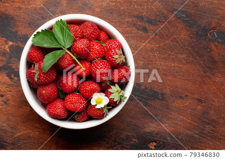 Strawberry bowl with ripe garden berries Strawberry bowl with ripe garden berries 79346830