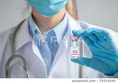 Doctor or scientist holding liquid vaccines booster. fight against virus covid-19 coronavirus, Vaccination and immunization. diseases,medical care,science, vaccine booster concept. 79354849