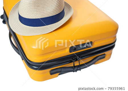 yellow suitcase with a combination lock with numbers 666 on it. Summertime - travel bag and straw hat on top yellow suitcase with a combination lock with numbers 666 on it. Summertime - travel bag and straw hat on top 79355961