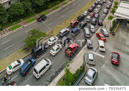 Traffic on highway in Bonifacio Global City, Taguig, Metro Manila Traffic on highway in Bonifacio Global City, Taguig, Metro Manila 79356473