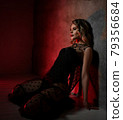 Sexy young blonde curly woman in transparent lace 79356684