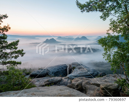 Beautiful morning view Saxony Switzerland. Sandstone peaks and hills Beautiful morning view Saxony Switzerland. Sandstone peaks and hills 79360697