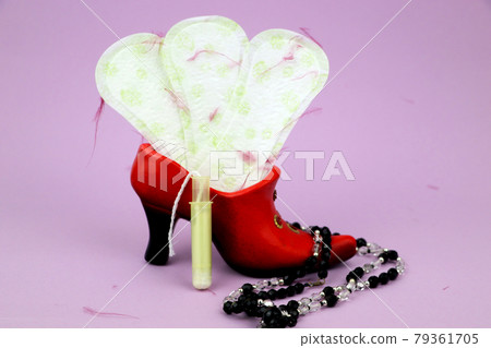 Medical conception photo. Red dreamy smile crochet blood drop, daily and menstrual pad and tampon, Woman critical days, gynecological menstruation cycle, Menstruation sanitary woman hygiene 79361705