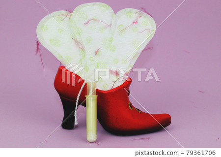 Medical conception photo. Red dreamy smile crochet blood drop, daily and menstrual pad and tampon, Woman critical days, gynecological menstruation cycle, Menstruation sanitary woman hygiene 79361706