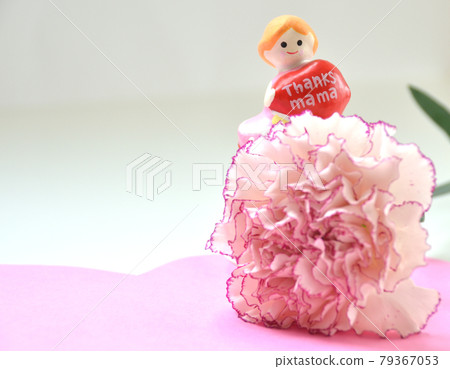 Dolls and carnations placed on a pink heart-Mother's Day image 79367053