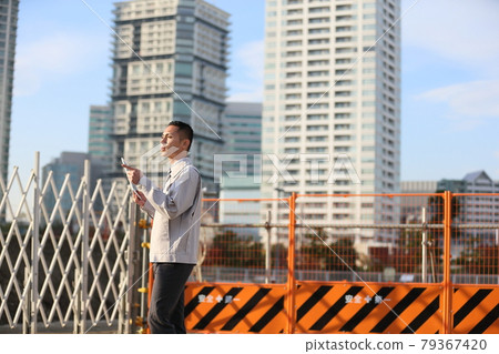 Uniform clock, office worker, new employee, worker, business, outdoor, young man, building, corona, sales copy space Uniform clock, office worker, new employee, worker, business, outdoor, young man, building, corona, sales copy space 79367420