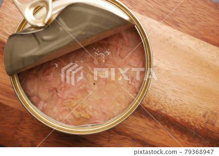 canned tuna on wooden table , 79368947