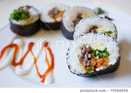 tuna Sushi on plate with chopstick on table tuna Sushi on plate with chopstick on table 79368948