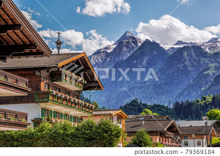 Kaprun village with typical pension against Kitzsteinhorn glacier in Salcburg region, Austrian Alps 79369184