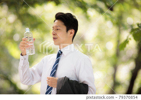 Businessman hydration heat stroke hot 79370854