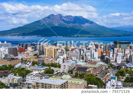 Sakurajima and Kagoshima cityscape seen from Shiroyama Park Observatory Sakurajima and Kagoshima cityscape seen from Shiroyama Park Observatory 79371526