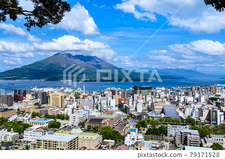 Sakurajima and Kagoshima cityscape seen from Shiroyama Park Observatory Sakurajima and Kagoshima cityscape seen from Shiroyama Park Observatory 79371528