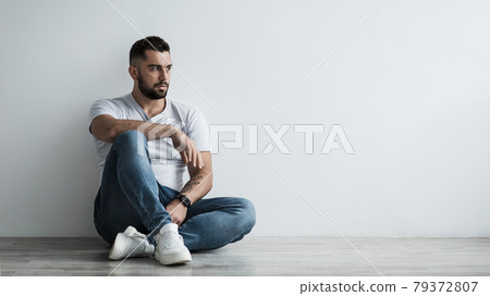 Lonely handsome man sad, stressed in self-isolation, suffering agoraphobia, depression Lonely handsome man sad, stressed in self-isolation, suffering agoraphobia, depression 79372807