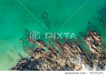 Amazing aerial view of crashing waves on rocks seascape nature view and Beautiful tropical sea with Sea coast view in summer season image by Drone High angle view Travel and website background concept Amazing aerial view of crashing waves on rocks seascape nature view and Beautiful tropical sea with Sea coast view in summer season image by Drone High angle view Travel and website background concept 79375241