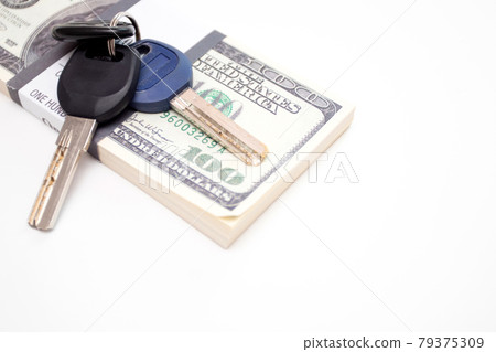 Bundle of dollars and key on white background 79375309