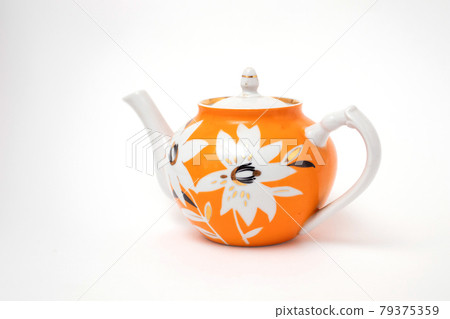 Porcelain Poland teapot with a pattern of flowers isolated on white background 79375359