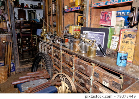 Inside a vintage old dusty car service workshop Inside a vintage old dusty car service workshop 79375449