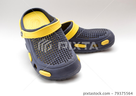 Blue rubber sandals isolated on the white background Blue rubber sandals isolated on the white background 79375564