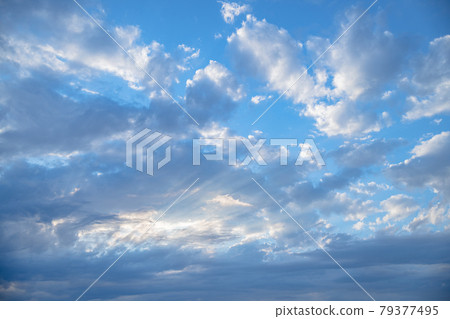 Blue sky on a cloudy day Blue sky on a cloudy day 79377495
