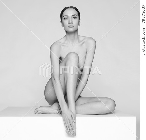 Fashion beautiful brunette with short haircut. studio portrait Fashion beautiful brunette with short haircut. studio portrait 79378637