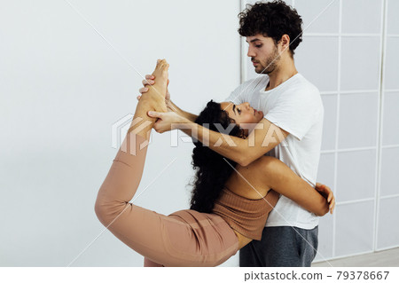 Male and female doubles yoga asana gymnastics fitness 79378667