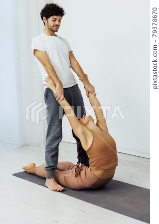 Man and woman paired family yoga asana gymnastics fitness 79378670