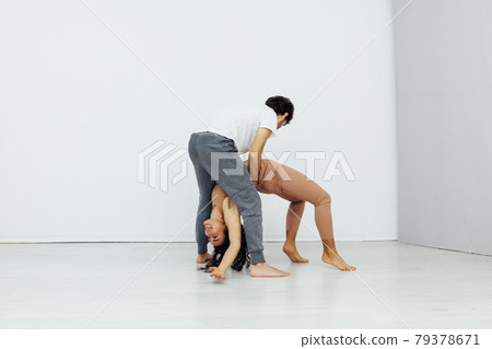 Man and woman paired family yoga asana gymnastics fitness Man and woman paired family yoga asana gymnastics fitness 79378671