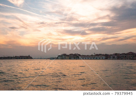 Beautiful view of the Venice lagoon on a sunset, Italy. Tourist background Beautiful view of the Venice lagoon on a sunset, Italy. Tourist background 79379945