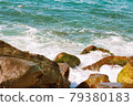 blue sea and brown stones 79380183