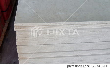 Stack of gypsum boards. Drywall packs. Close-up Stack of gypsum boards. Drywall packs. Close-up 79381611