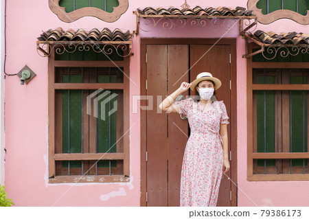 Travelers on street Phuket old town with Building Sino Portuguese architecture at Phuket Old Town area Phuket, Thailand. Travel concept 79386173