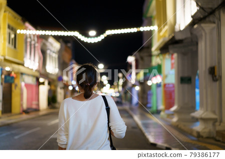 Travelers on street Phuket old town with Building Sino Portuguese architecture at Phuket Old Town area Phuket, Thailand. Travel concept 79386177