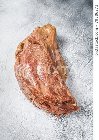 Raw marinated beef tri-tip steak for roast. White background. Top view Raw marinated beef tri-tip steak for roast. White background. Top view 79386273