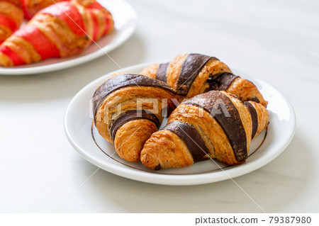 fresh croissant with chocolate fresh croissant with chocolate 79387980