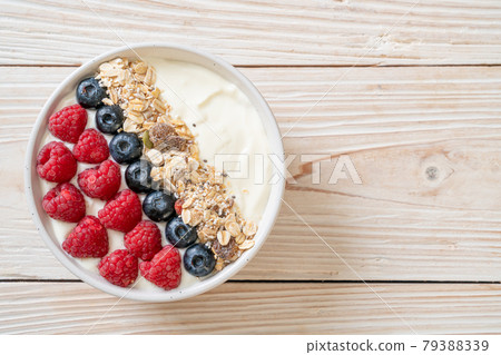 homemade yogurt bowl with raspberry, blueberry and granola homemade yogurt bowl with raspberry, blueberry and granola 79388339
