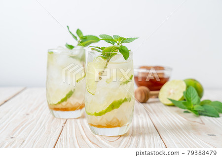 iced honey and lime soda with mint iced honey and lime soda with mint 79388479