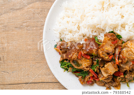 stir-fried crispy pork belly and basil with rice stir-fried crispy pork belly and basil with rice 79388542