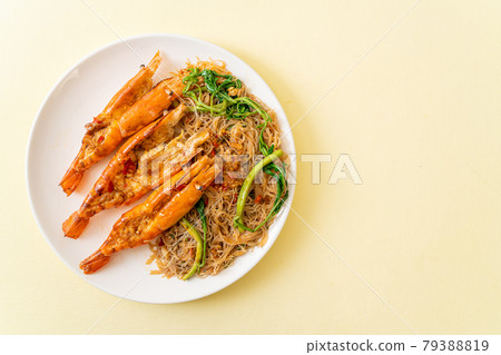 Stir-fried rice vermicelli and water mimosa with river prawns 79388819