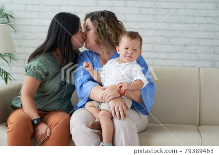 Young Lesbian Couple Kissing Young Lesbian Couple Kissing 79389463
