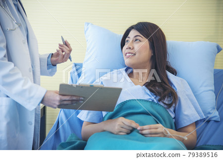 Woman doctor and patient consultation with professional specialist diagnostics at hospital medicare treatment clinic. Doctor writing prescription for medical health care therapy. Woman doctor and patient consultation with professional specialist diagnostics at hospital medicare treatment clinic. Doctor writing prescription for medical health care therapy. 79389516