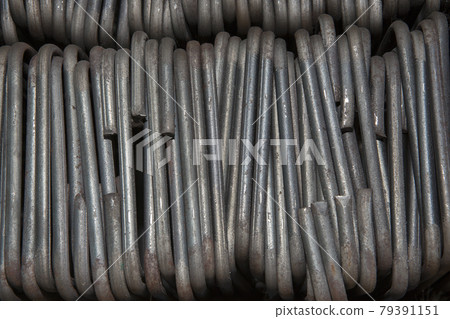 Steel bars close- up background. Reinforcing bar background Steel bars close- up background. Reinforcing bar background 79391151