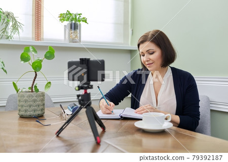 Mature woman psychologist, professional counselor giving video consultation Mature woman psychologist, professional counselor giving video consultation 79392187