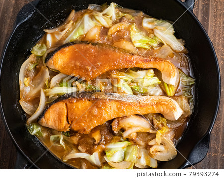 Grilled salmon on a wooden table 79393274